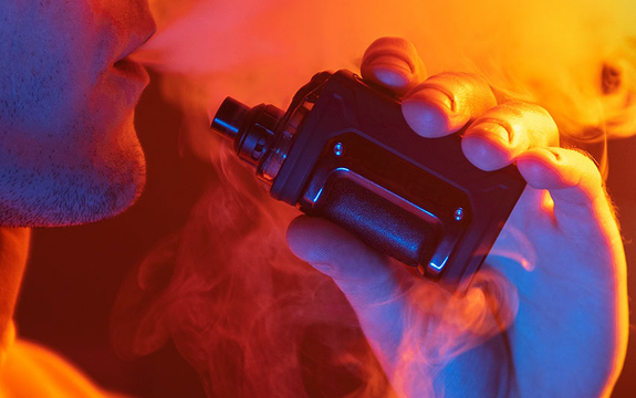 Man uses e-cigarette
